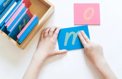 Children engaged in Montessori learning at Forest Grove Pre-School - photo 15