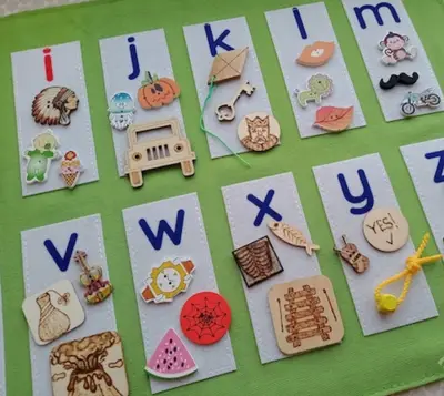 Children engaged in Montessori learning at Forest Grove Pre-School - photo 17