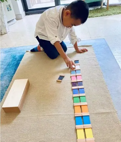 Children engaged in Montessori learning at Forest Grove Pre-School - photo 18