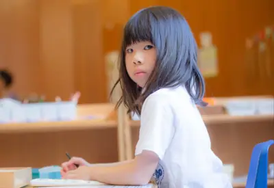 Children engaged in Montessori learning at Forest Grove Pre-School - photo 36