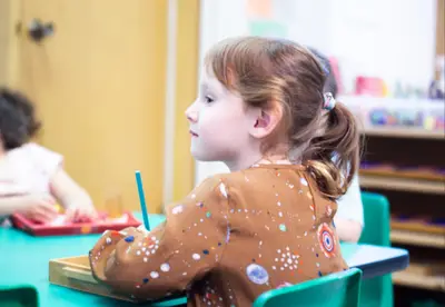 Children engaged in Montessori learning at Forest Grove Pre-School - photo 37