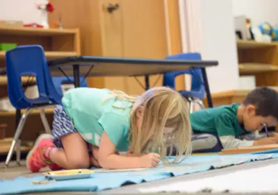Children engaged in Montessori learning at Forest Grove Pre-School - photo 39