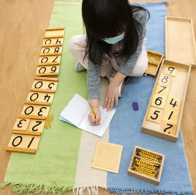 Children engaged in Montessori learning at Forest Grove Pre-School - photo 41